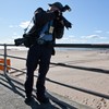 New York Daily News photographer Todd Maisel shooting a crime scene at Coney Island. 